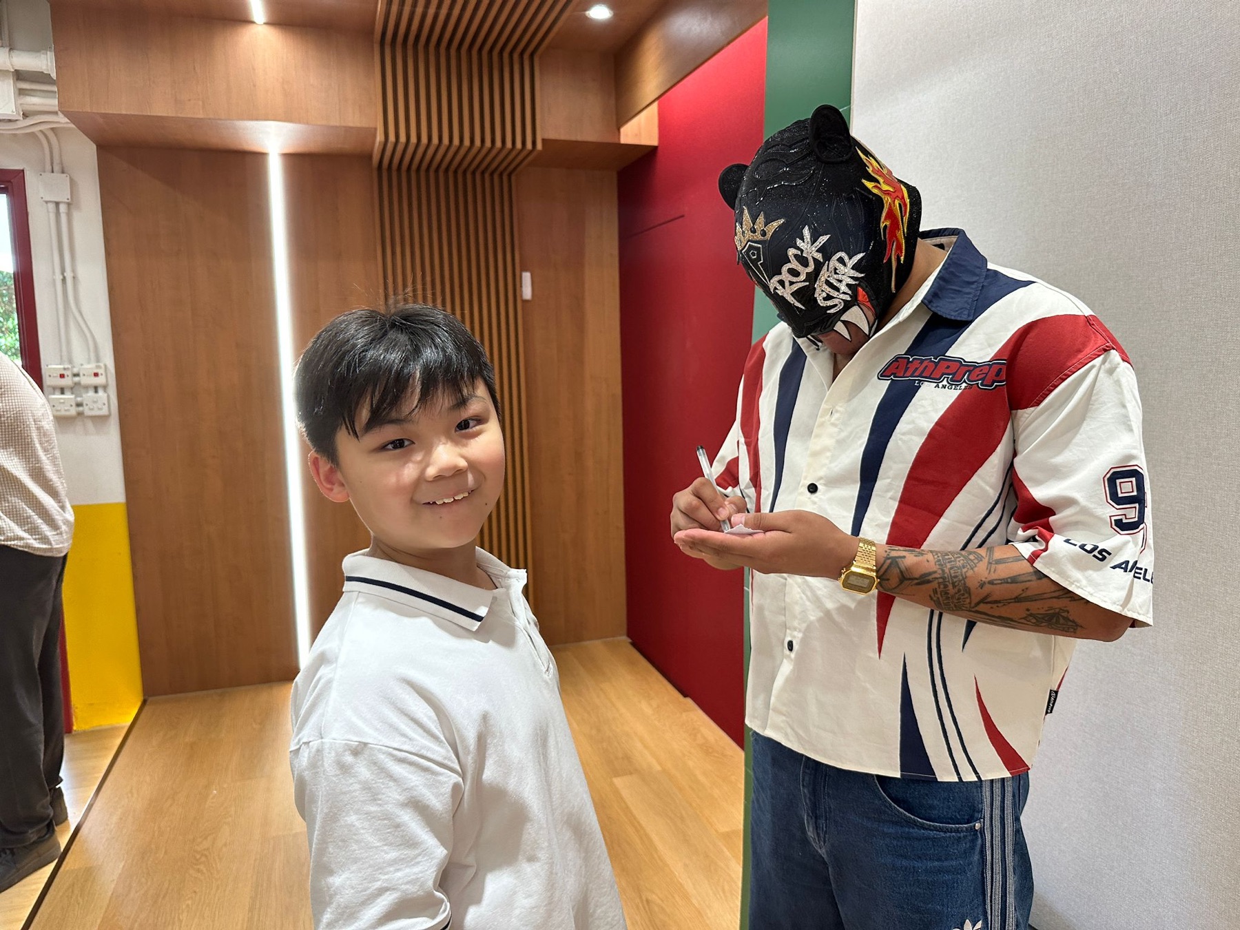 SSHK students meeting visiting Lucha Libre performers